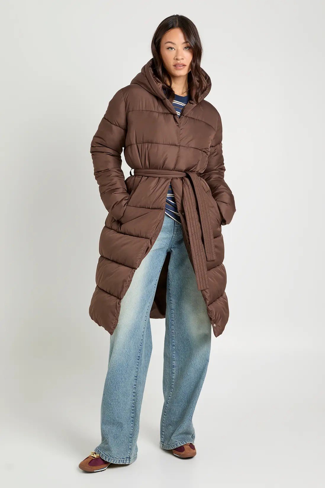 Veste doudoune longue ceinturée